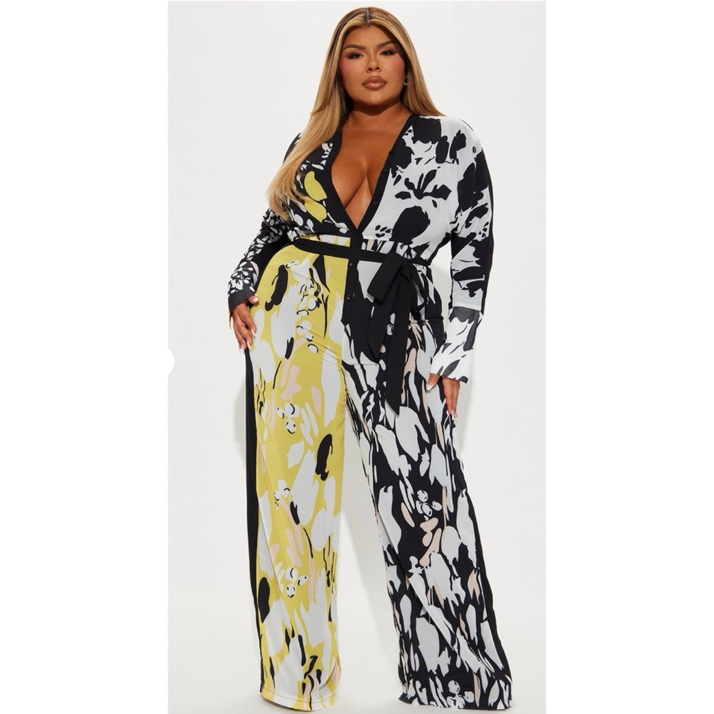 Black and White Jumpsuit with Plunging V-Neck and Wide-Leg Design